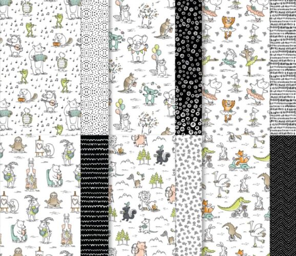 stampin' up zoo crew designer series paper with images of animals and black and white prints.