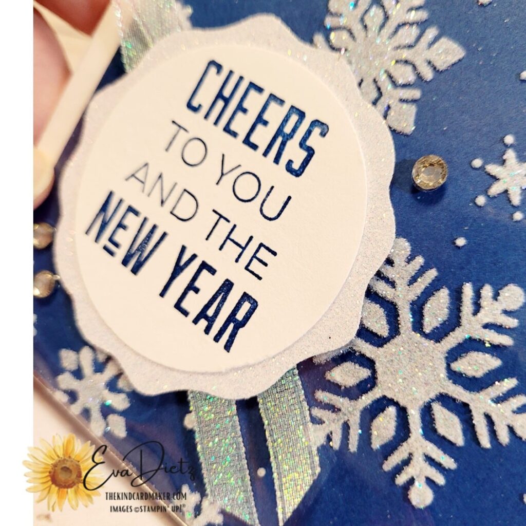 extreme close up of tag on the card front that says cheers to you and the new year