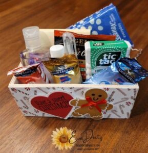 Mini wooden crate filled with an assortment of items to help you eliminate holiday stress.