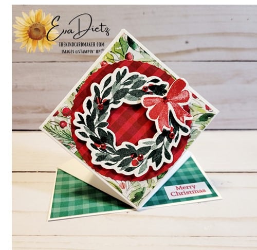Photo of the front view of the Diamond Pop-Up Fun Fold Card that is in red and green colors with a holiday wreath on the front.