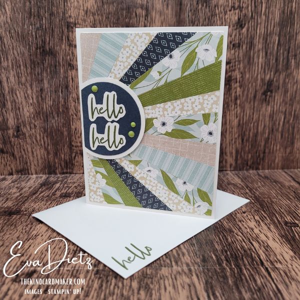 Coordinating handmade card and envelope with scrappy sunburst design and floral paper