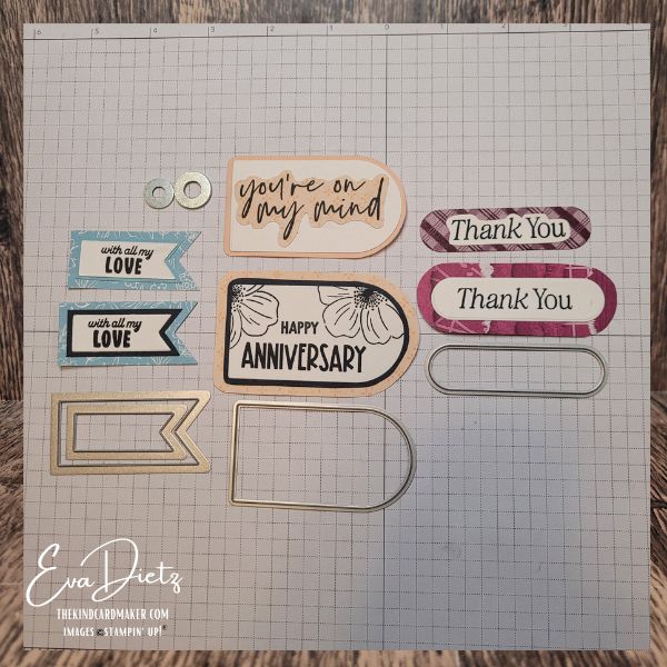 Handmade cardmaking tags showing layered die cut shapes created by tracing simple dies for custom borders and contrast