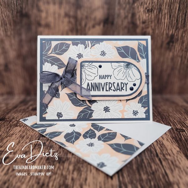 Card made with Arched “Happy Anniversary” tag with layered cardstock showing even border created using die tracing and washer technique