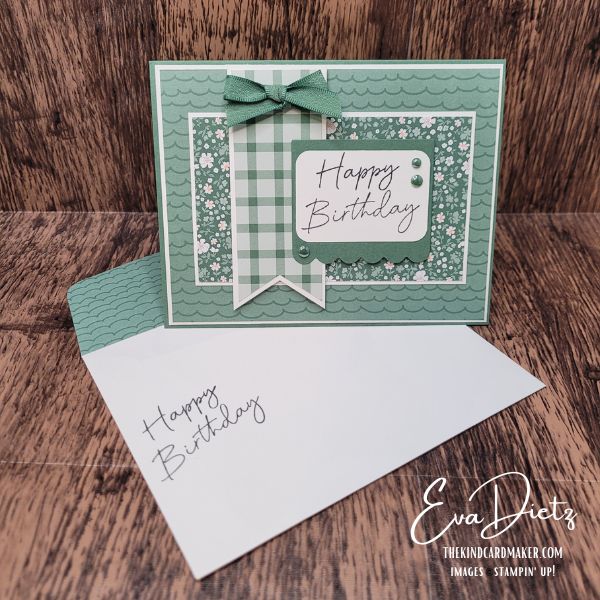 Handmade Happy Birthday card in Peaceful Pine featuring layered designer paper, ribbon bow, and scalloped sentiment tag.