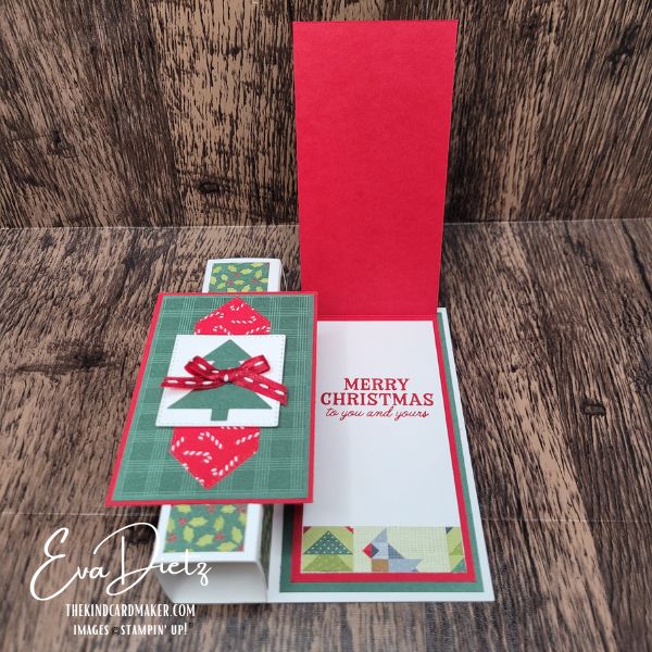 Open Pop-Up Pillar Christmas card revealing inside greeting panel and dimensional fold.