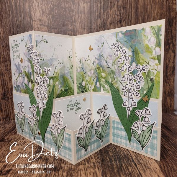 Open view of a Lily of the Valley Tall Triple Z Fold card showing the unique layered fold and panoramic floral designer paper.